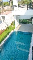 The pool seen from the walkway leading to the upper level deck.